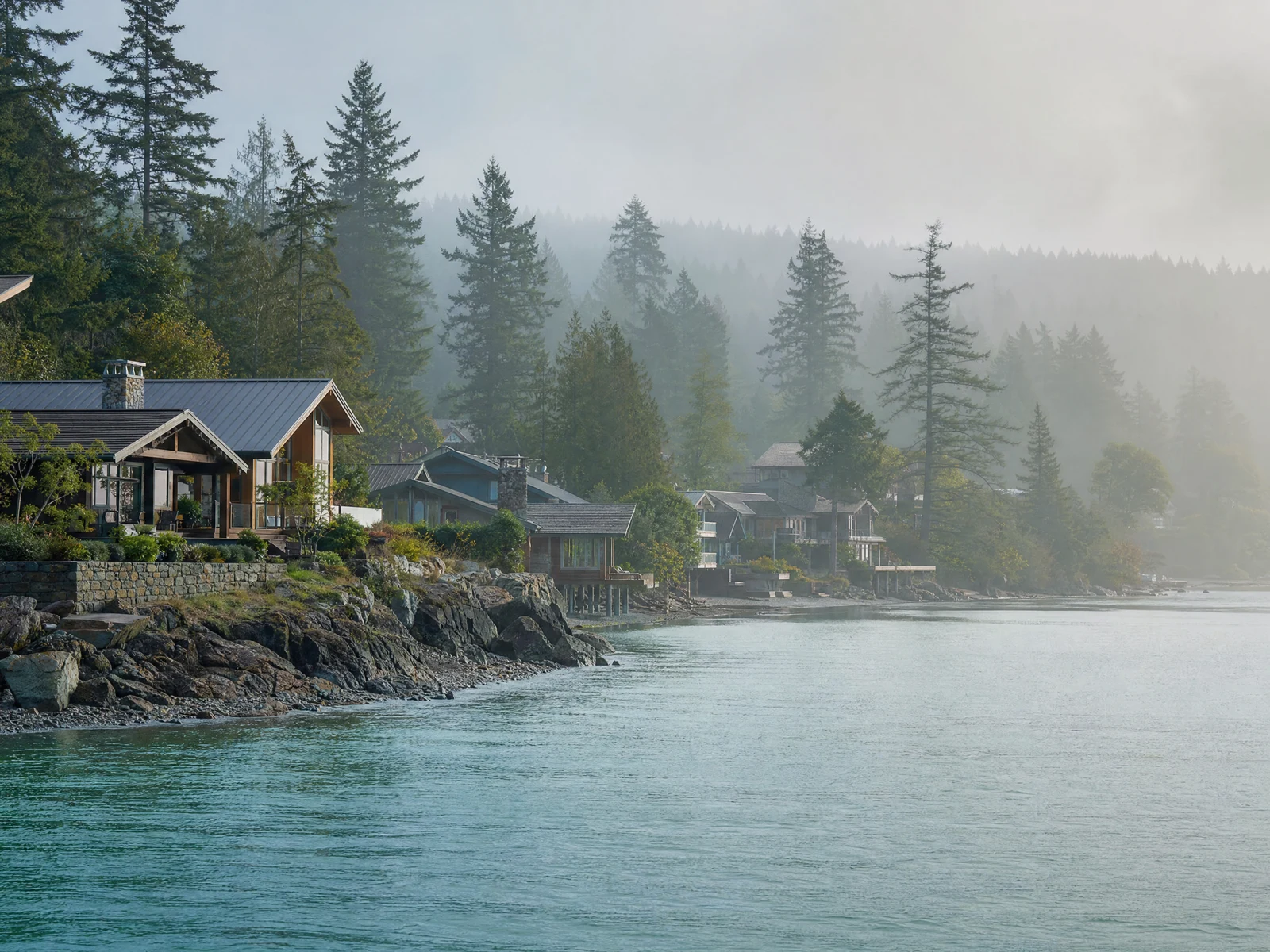 Illustrative Puget Sound inlet with hillside homes